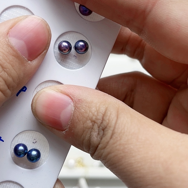 茶***茶银S925镶嵌淡水珍珠耳饰