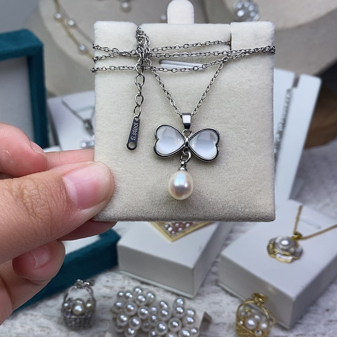 淡水珍珠银S925镶嵌耳饰