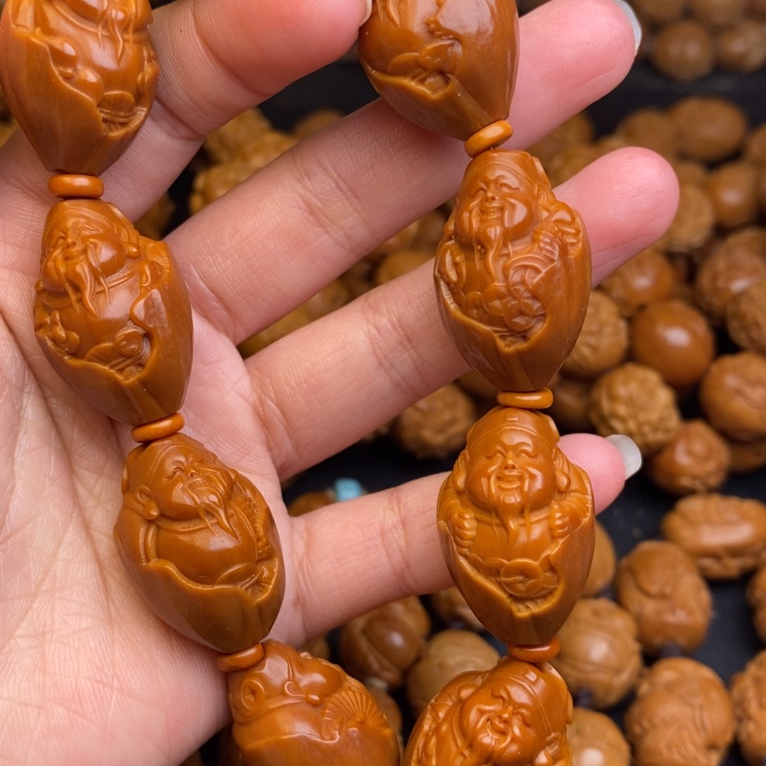 橄榄核吊坠包衣财神1.7+