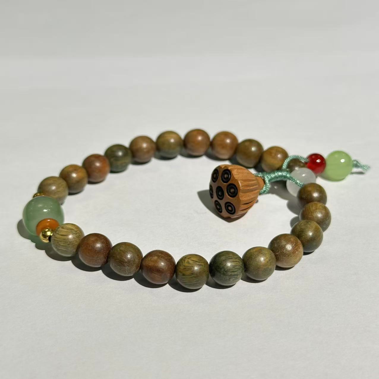 SC1001绿檀手串0.8*21（无礼盒）