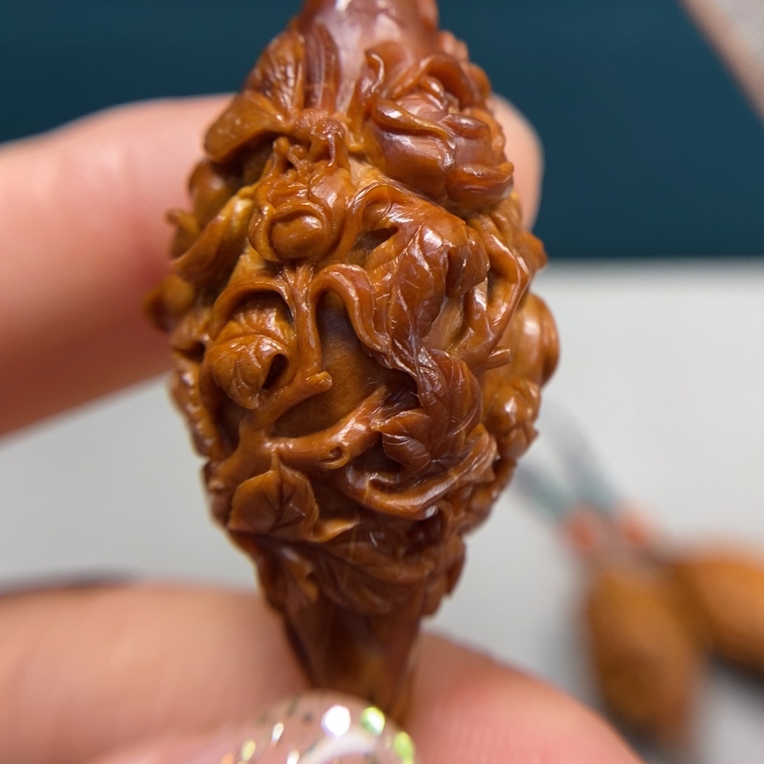 橄榄核吊坠花草单子