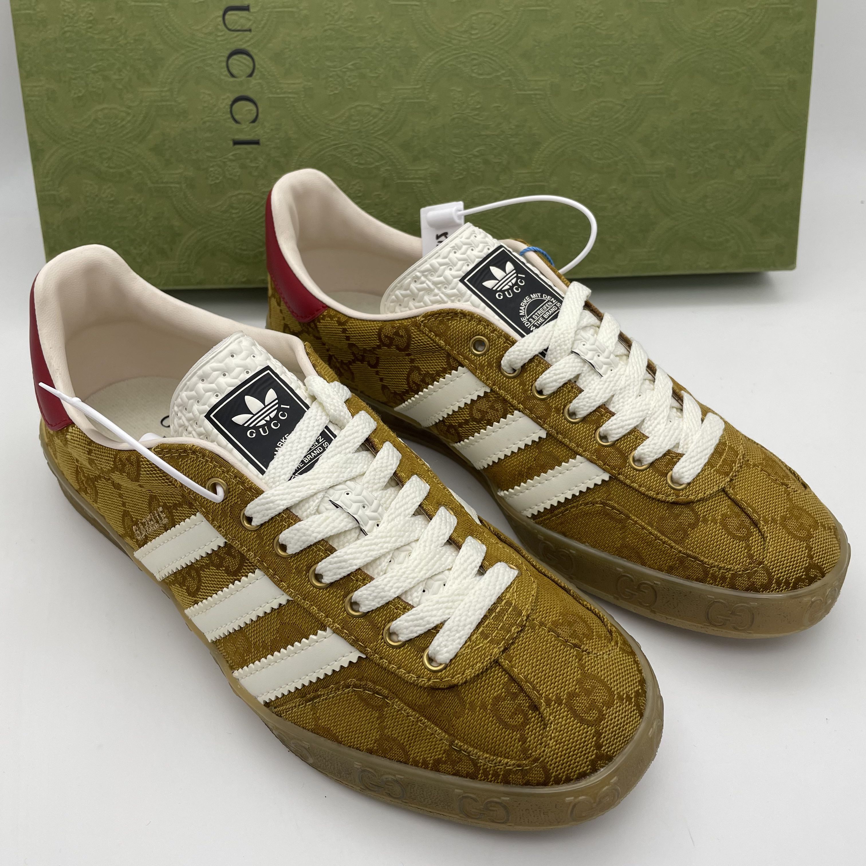 99新 GUCCI/古驰 /40码/男士 复古黄色老花双G透气舒适红尾板鞋