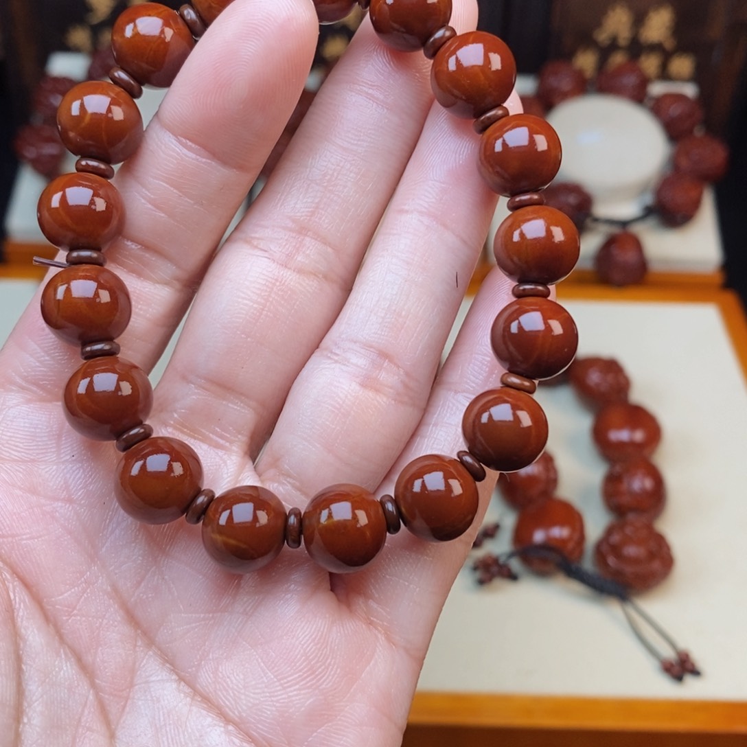 橄榄核吊坠对****她光珠光珠