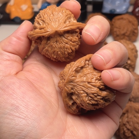 捞***把文玩核桃吊坠红狮子