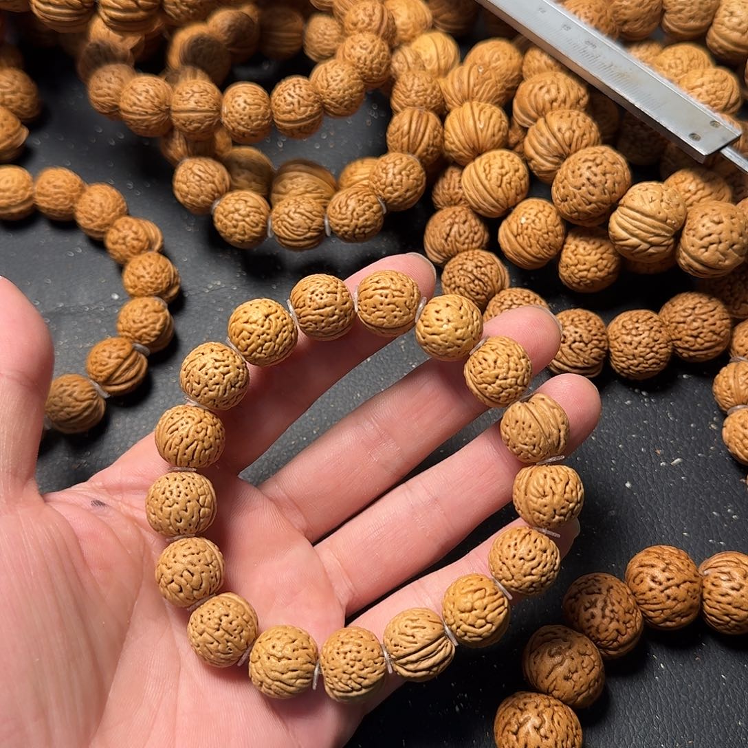 断***悟桃核吊坠金刚纹手串