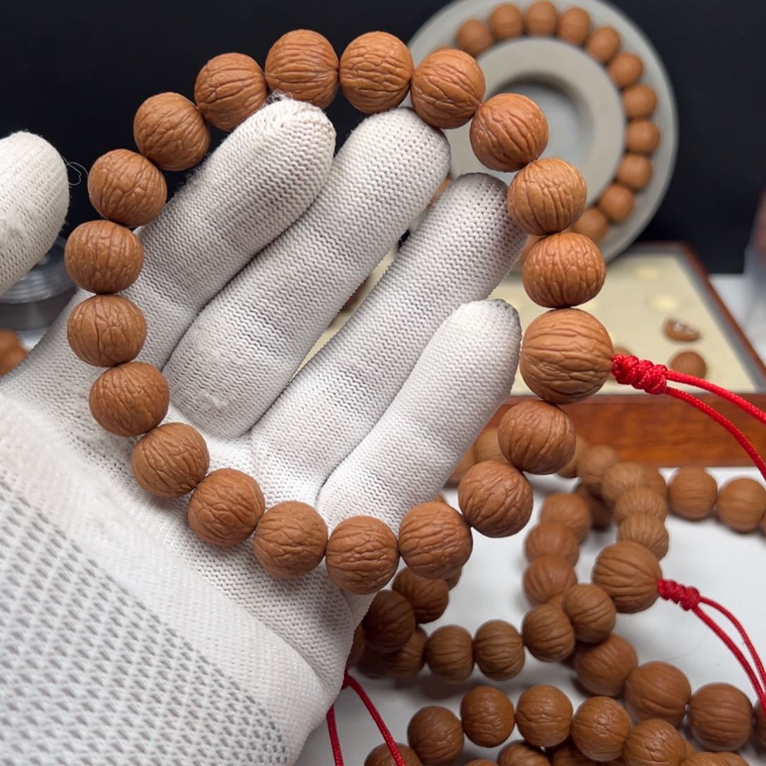 猴头核桃手串语****）13.8凤羽