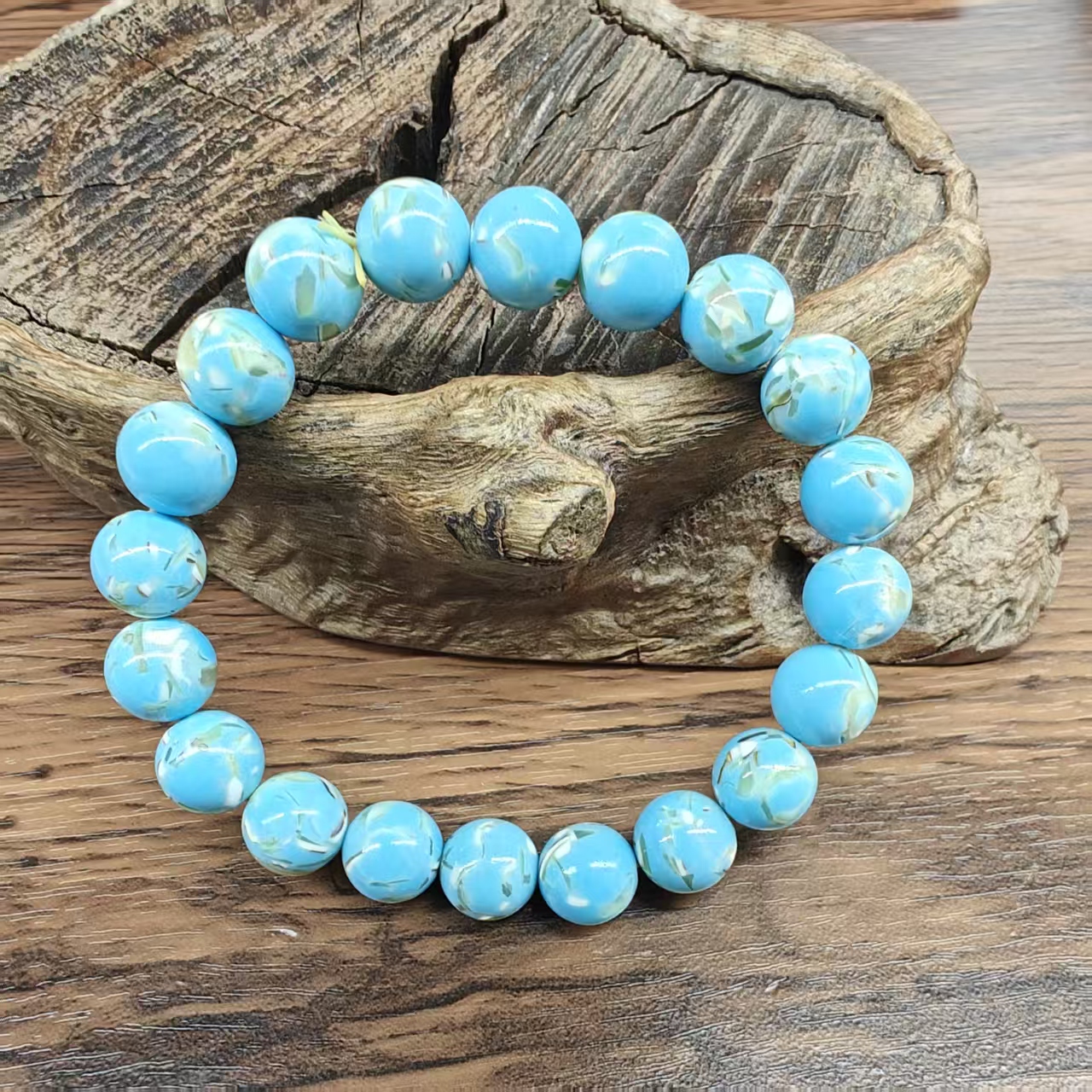 YL0255    孔雀蓝车车正圆手串约10mm