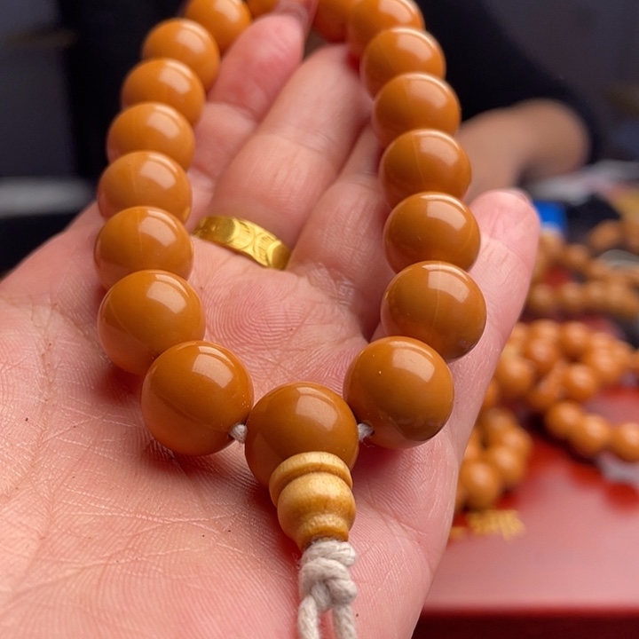 橄榄核吊坠猴头手串