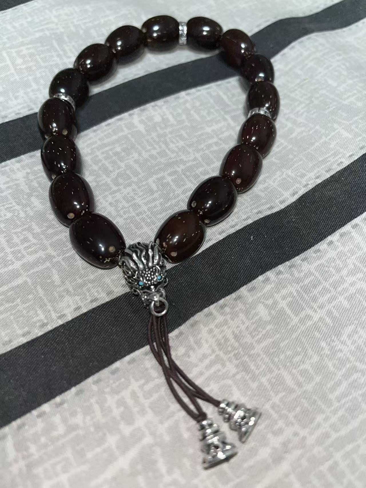 紫金鼠横切桶珠手持，龙头坠饰设计