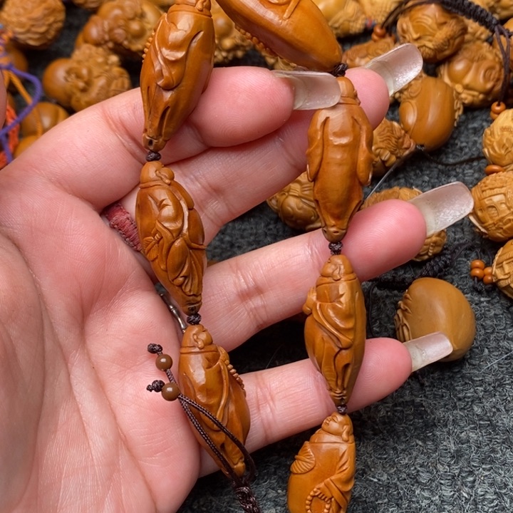 吊坠橄榄核同时建立了健健康康哭哭哭