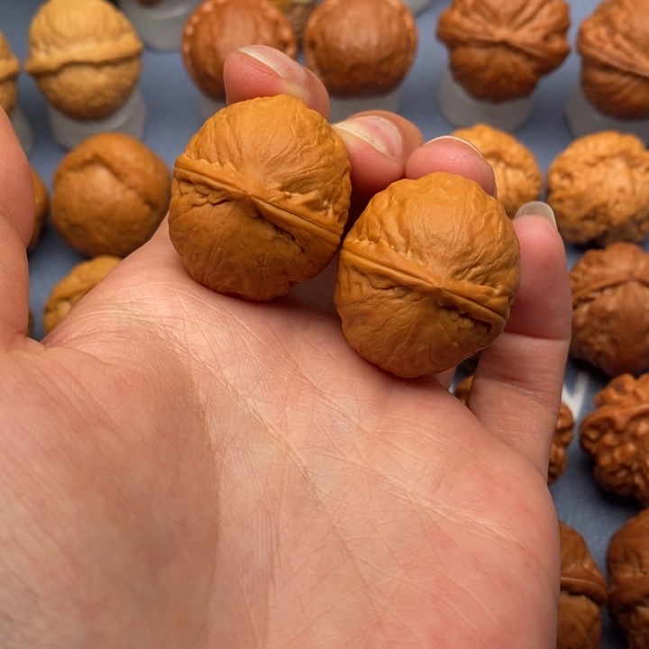 文玩核桃把件光头元宝