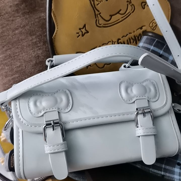 挂脖款蓝色蝴蝶结定型包