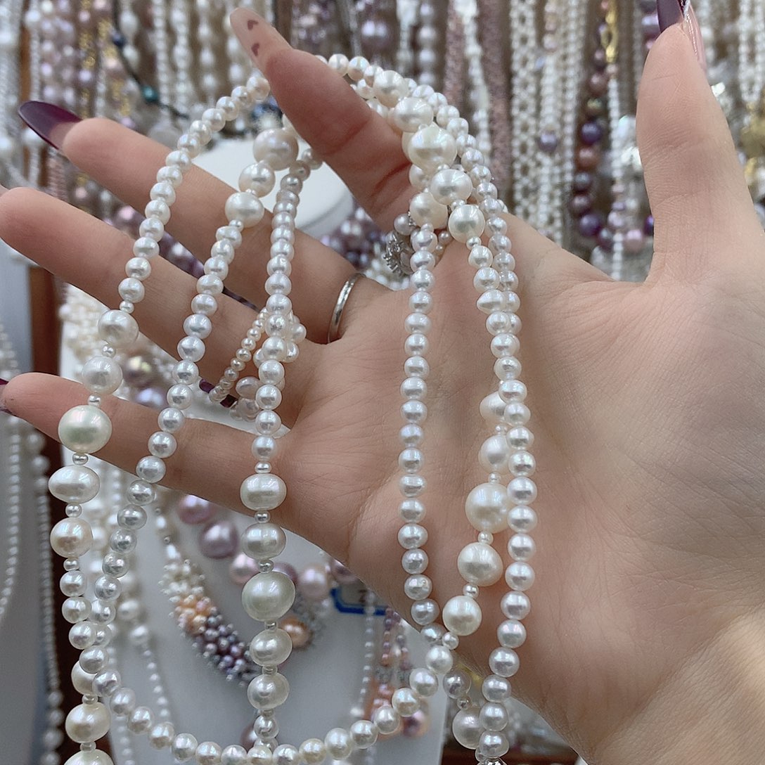 天***树淡水珍珠耳饰银S925镶嵌