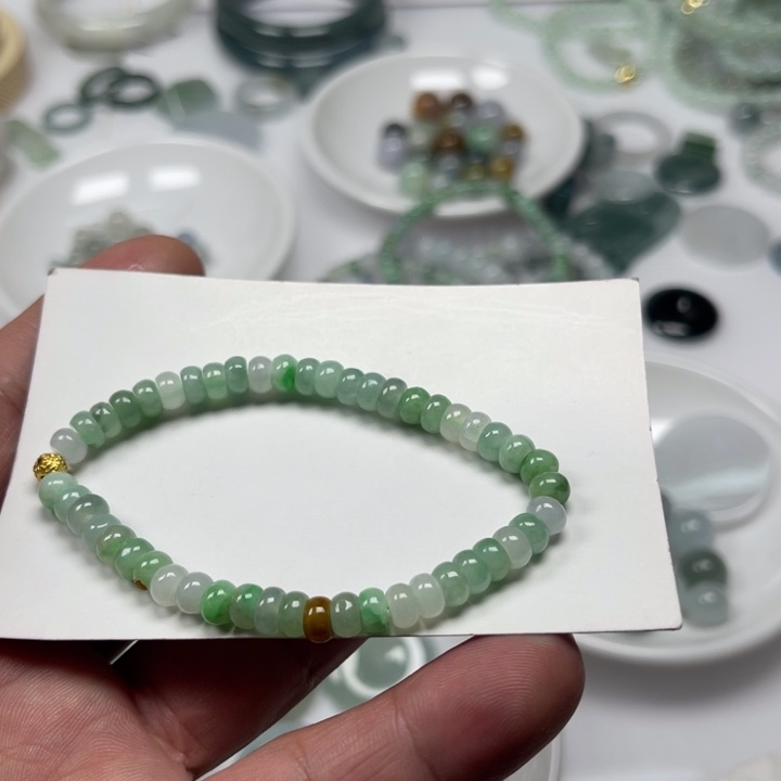 翡翠未镶嵌耳坠卡5.7多宝手串5555