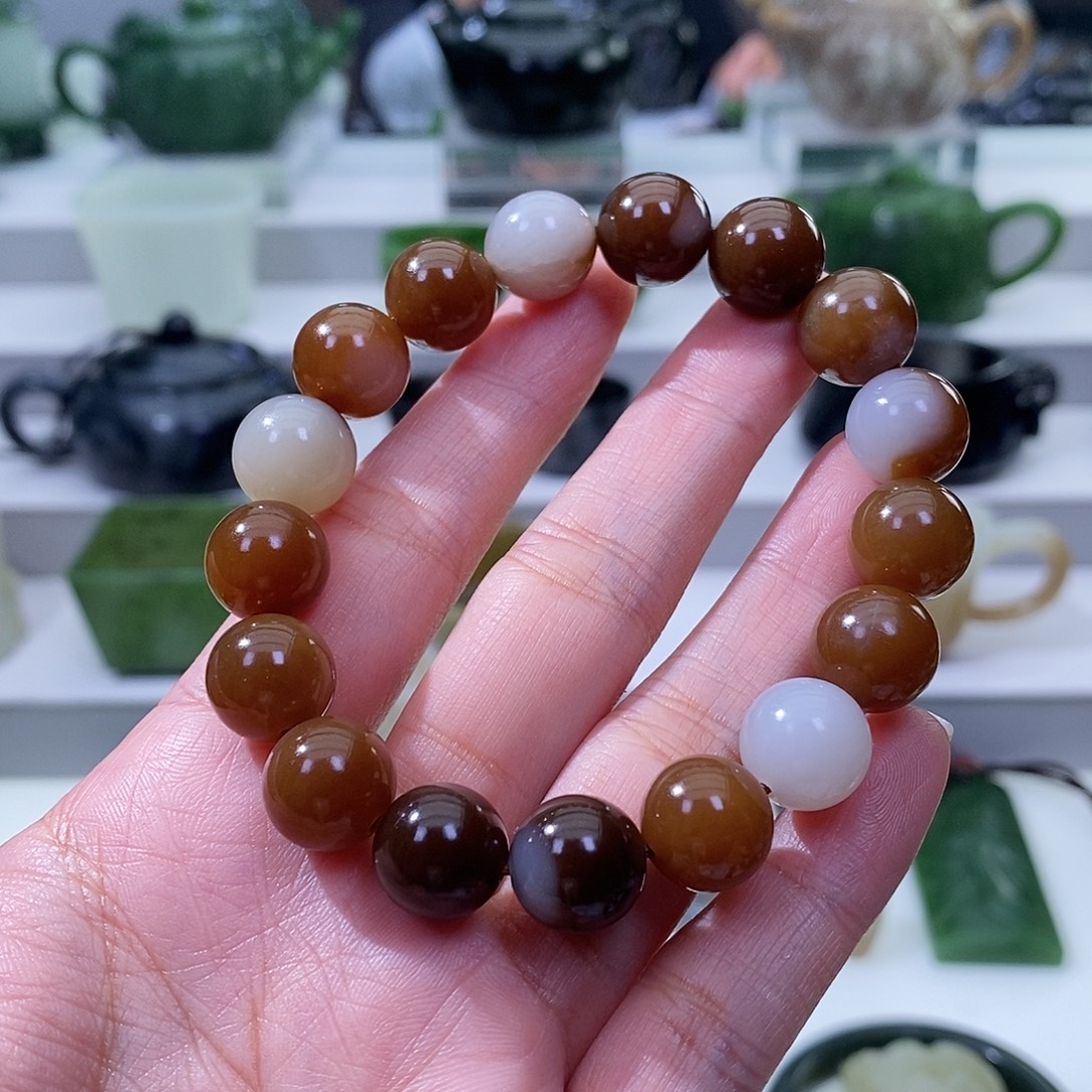 朱***林和田玉未镶嵌挂件手串