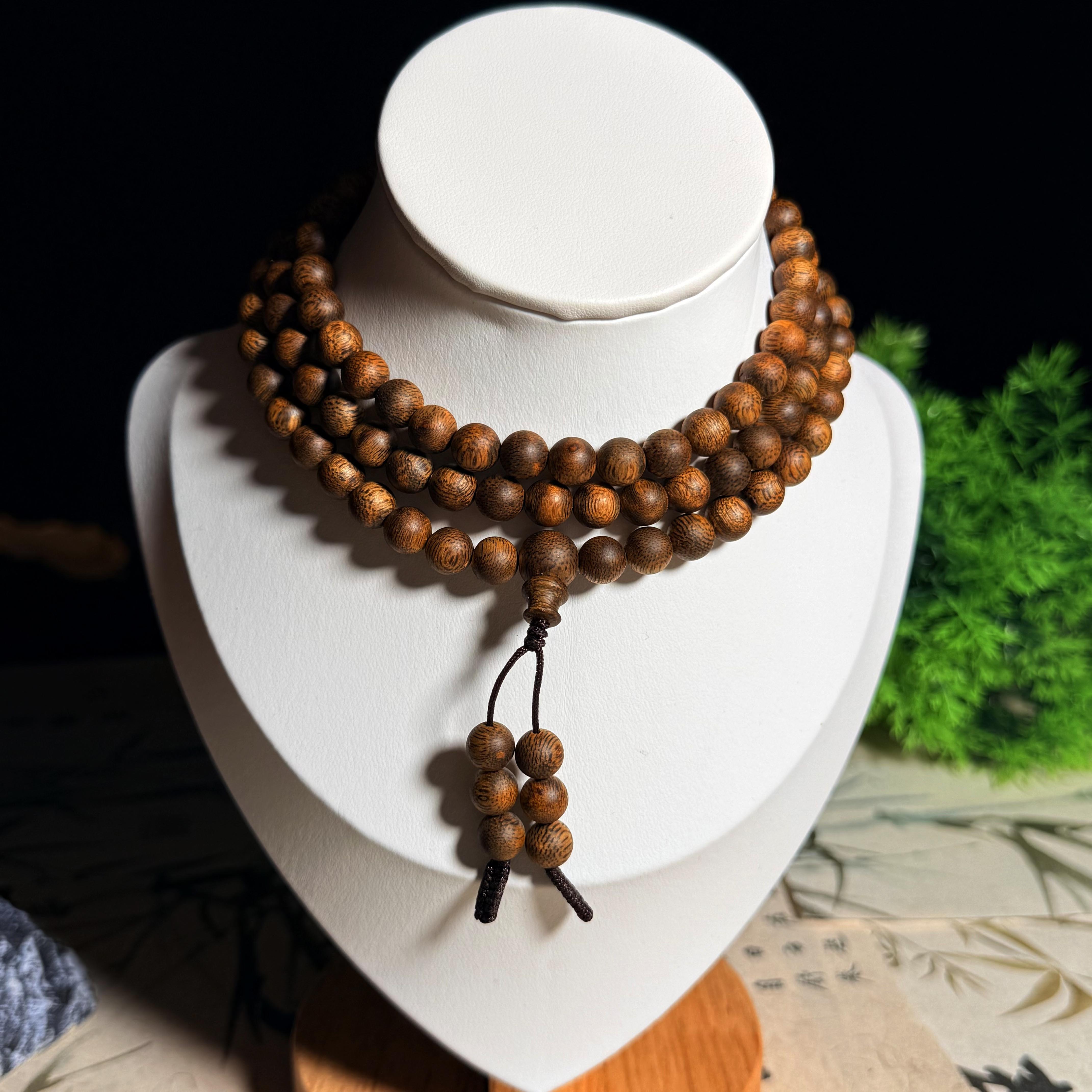 沉香海南天然老白棋楠留疤0.7圆珠多圈多样性发其一