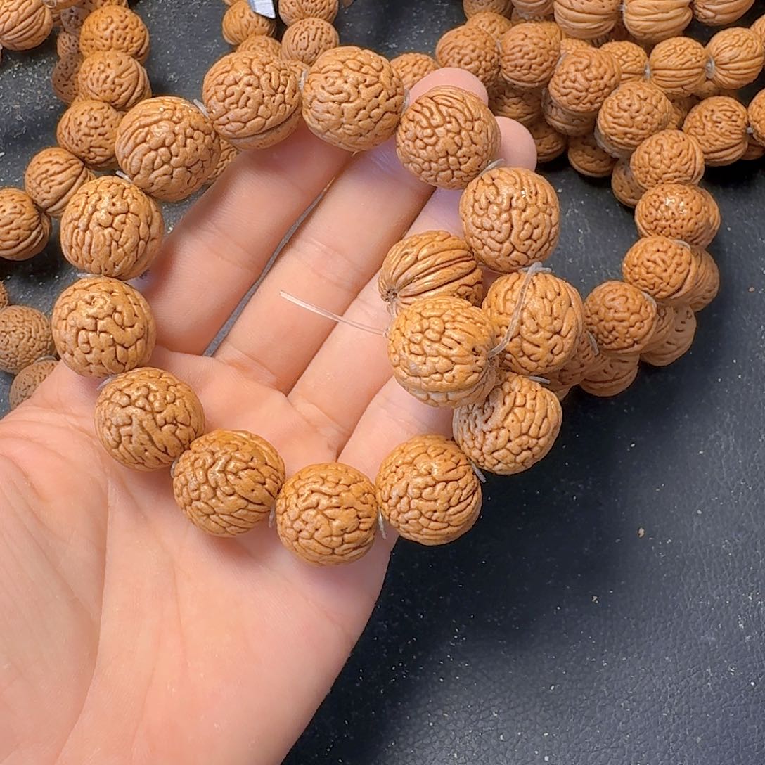 星***辉吊坠桃核荔枝纹手串