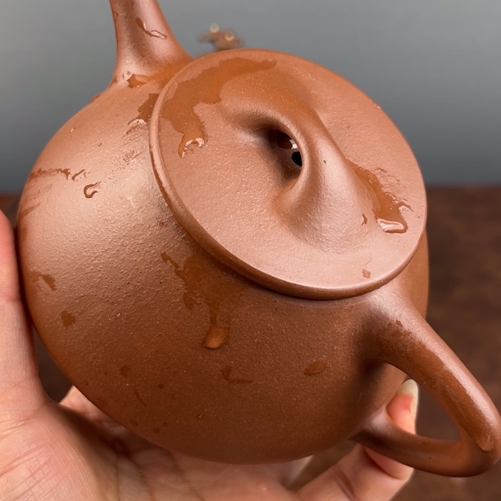 紫砂茶杯是一个人吗笑