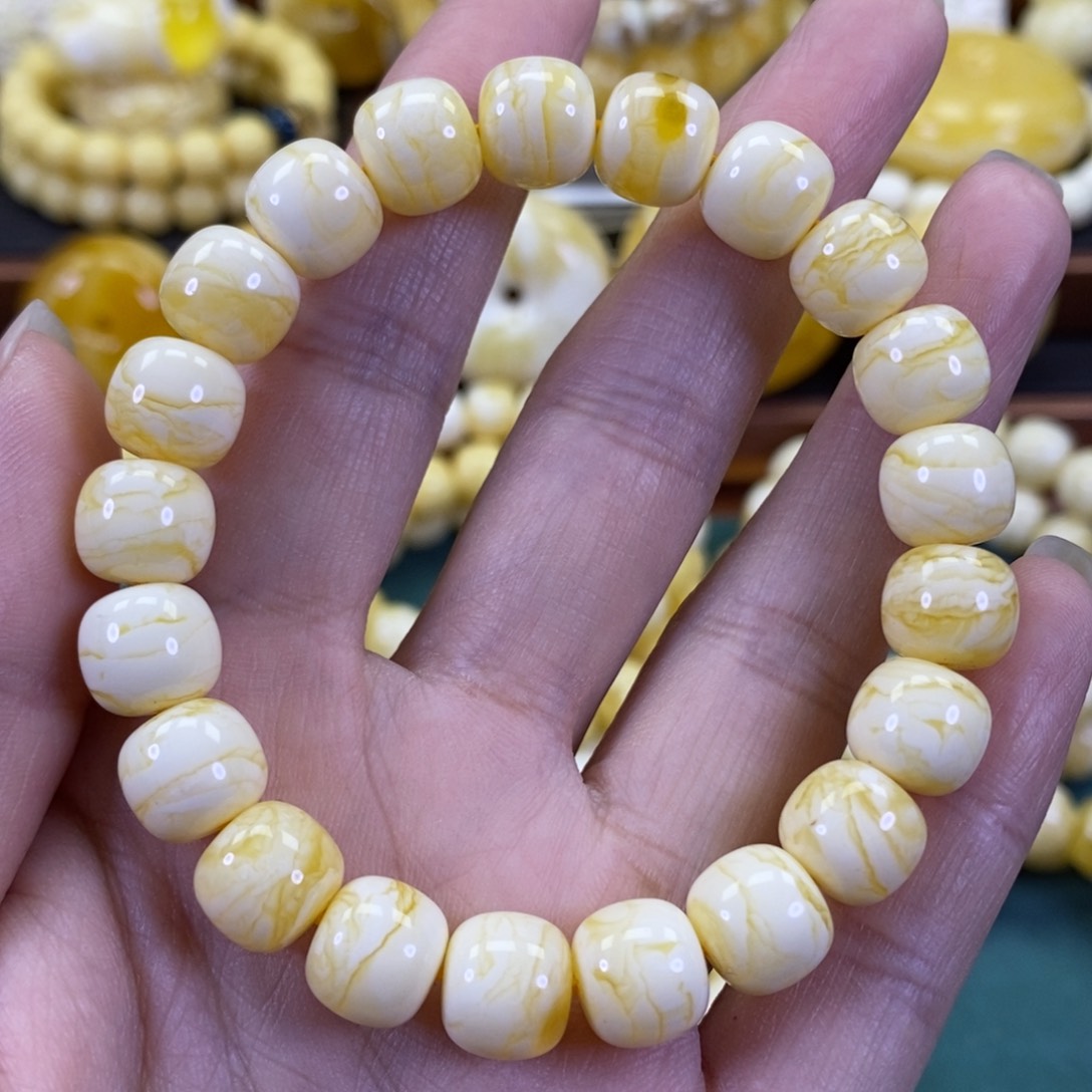 琥珀裸石未镶嵌同料橘白虎皮手串