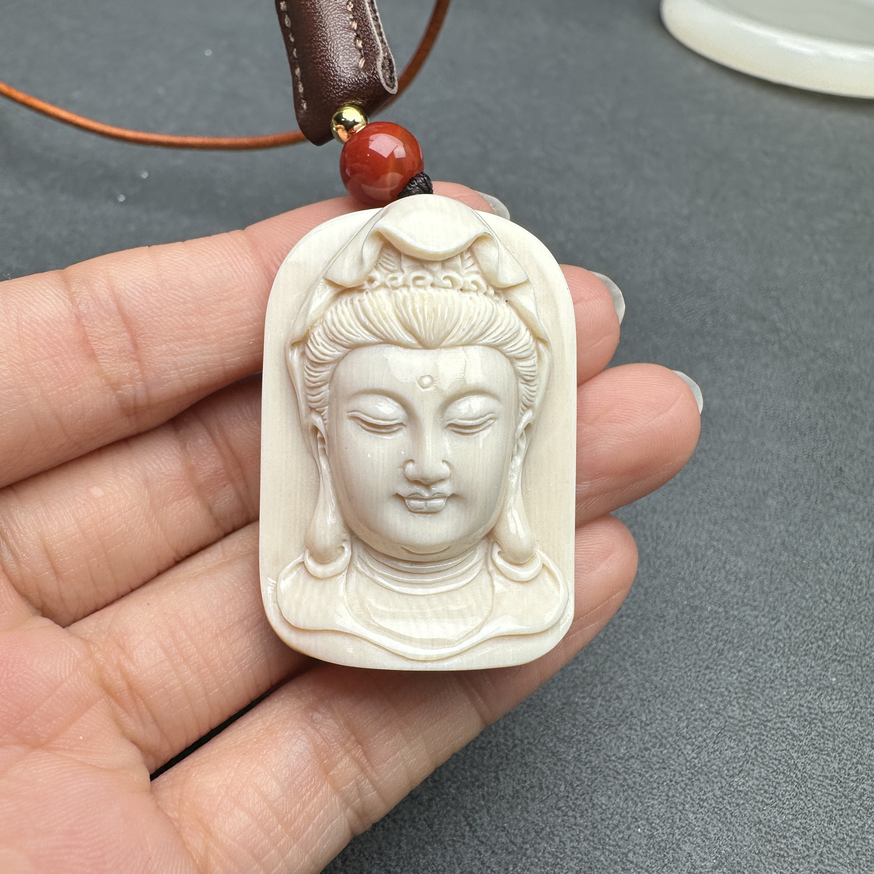 K7132天然猛犸牙 雕刻牌 28*40*12mm支持鉴定 假一罚四