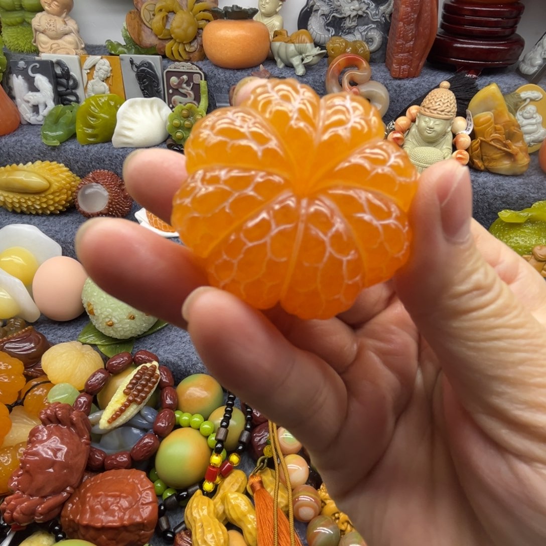 A***刚石材橘子手把件大吉大利