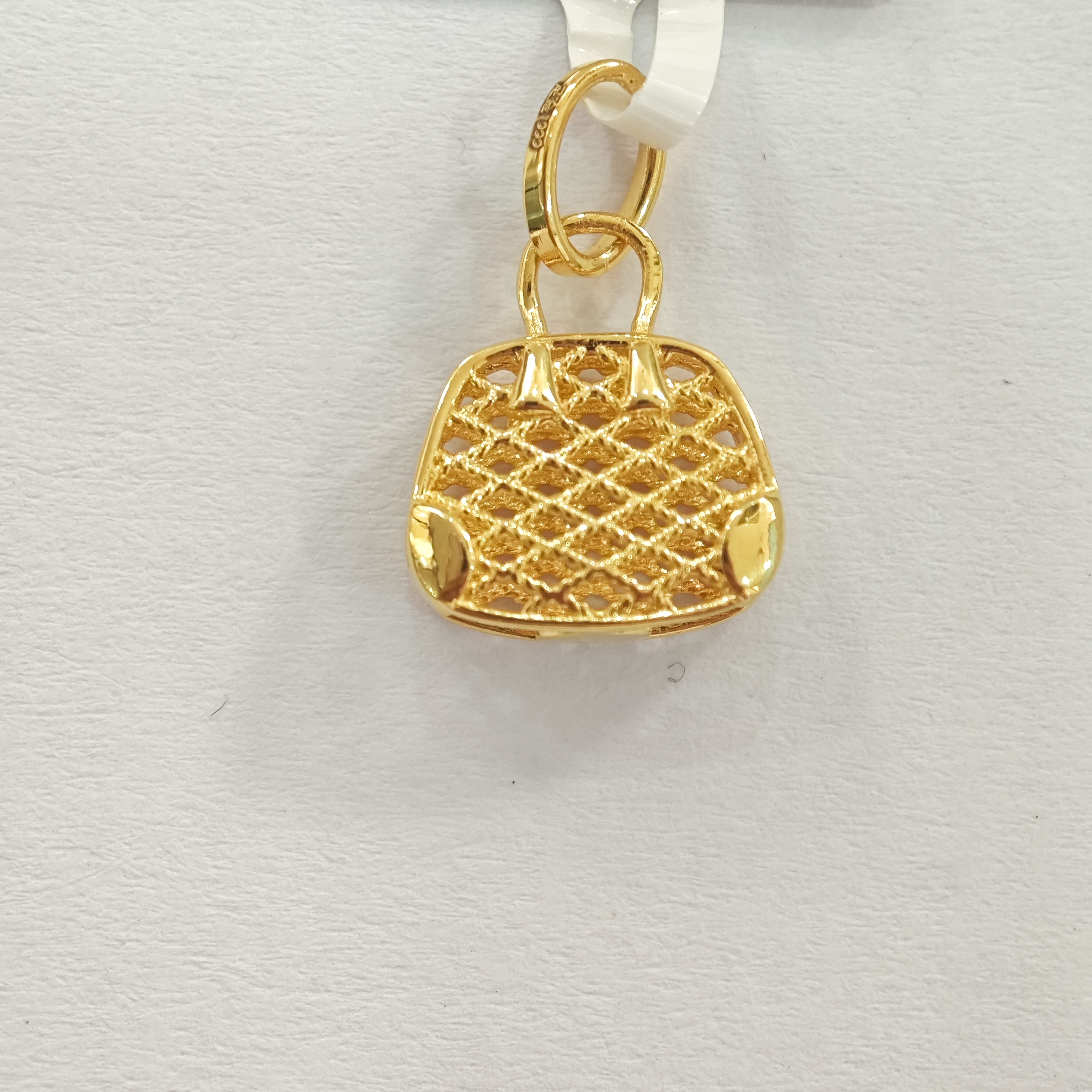 【木木专享】足金999饰品 镂空挎包吊坠 1.54 GP