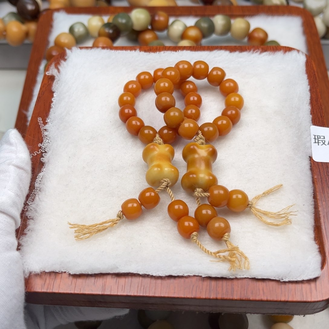 菩提根/象牙果吊坠瑕A125骨头挂件10mm一串随机