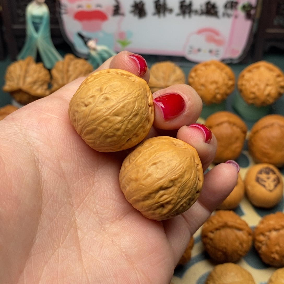 文玩核桃把件光头元宝