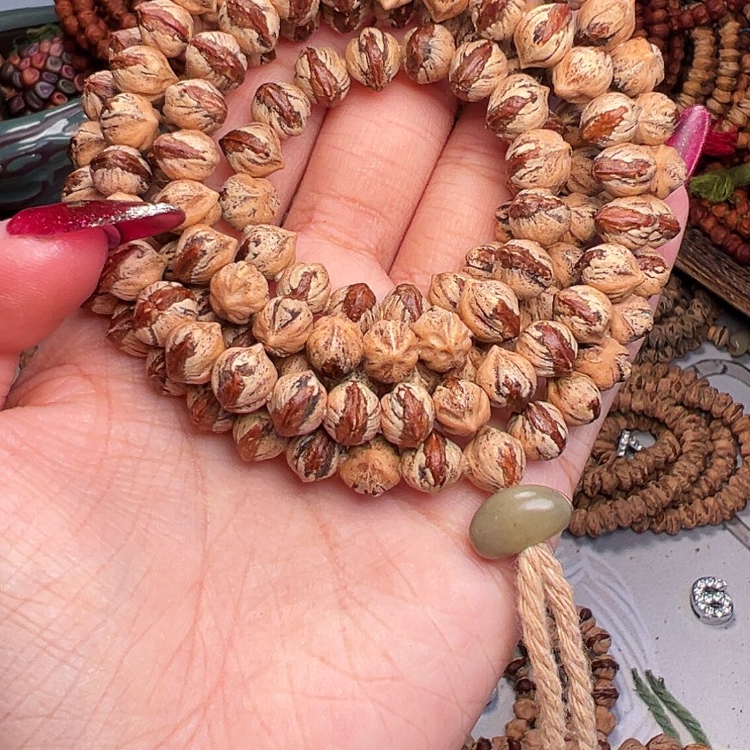 阿***吖柏香籽/百香籽吊坠