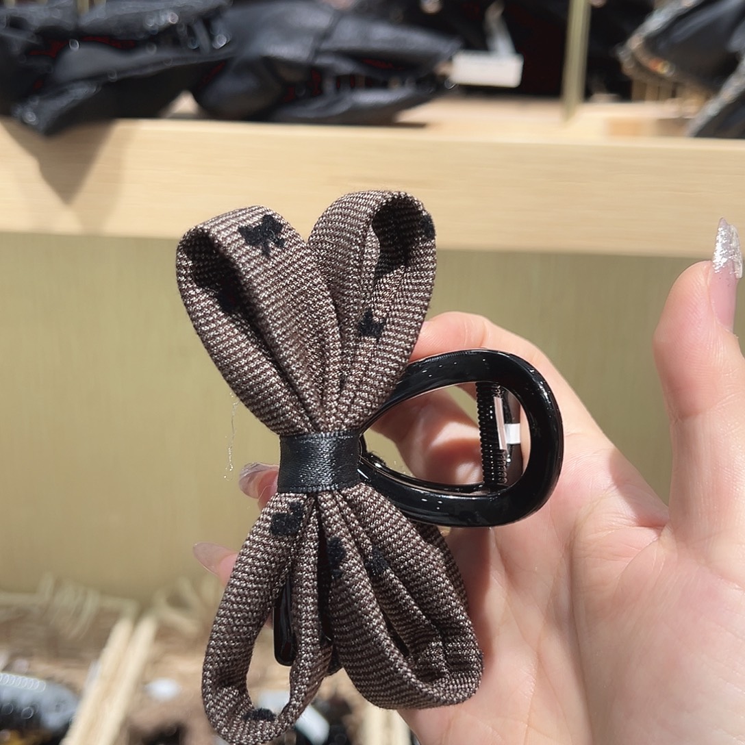 皮质铁合金咖色蝴蝶结中抓