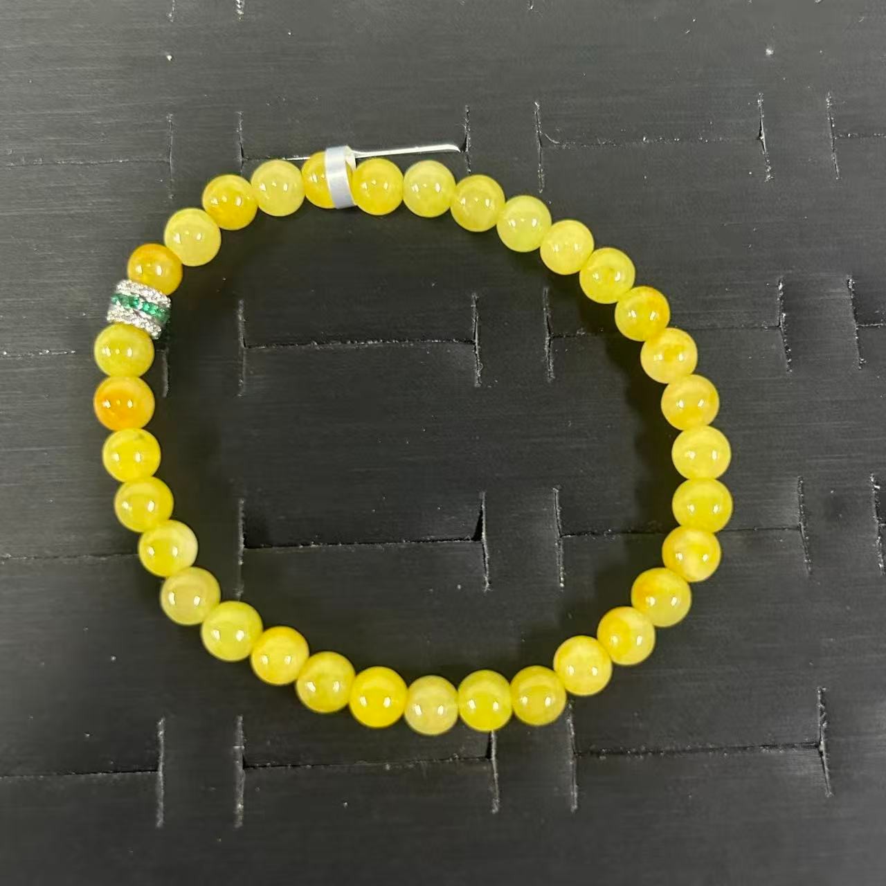 黄翠色圆珠玉石手串