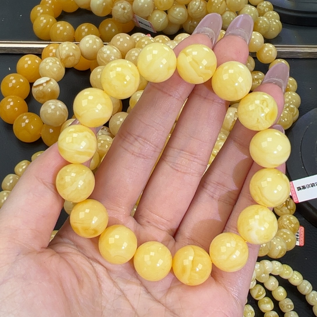 琥珀未镶嵌手链23.3黄白妖花