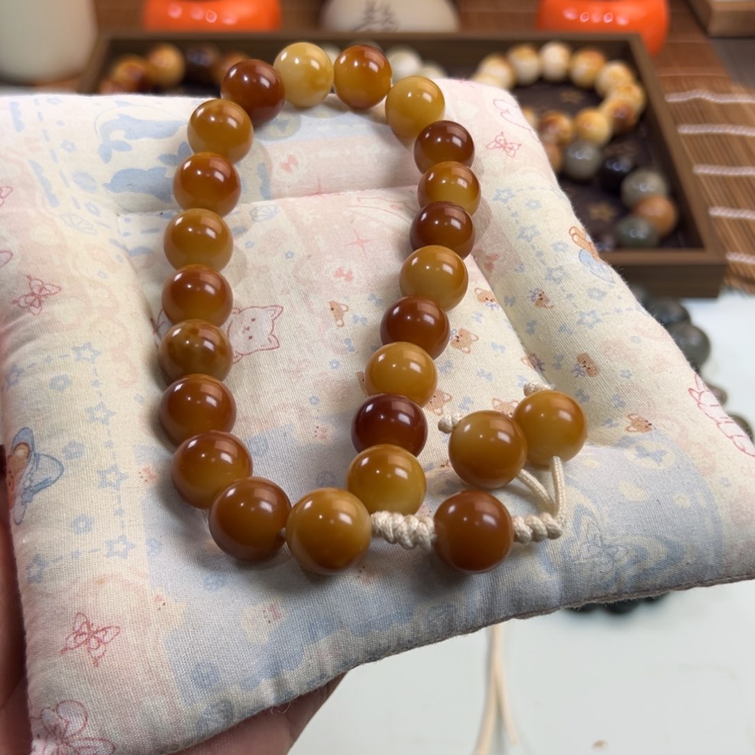 何***然吊坠菩提根/象牙果手持14mm