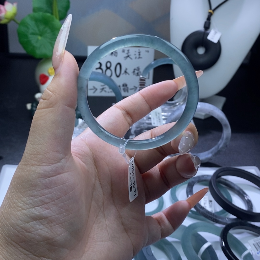 翡翠未镶嵌手镯成品买断起双眼皮的海水蓝53圆条