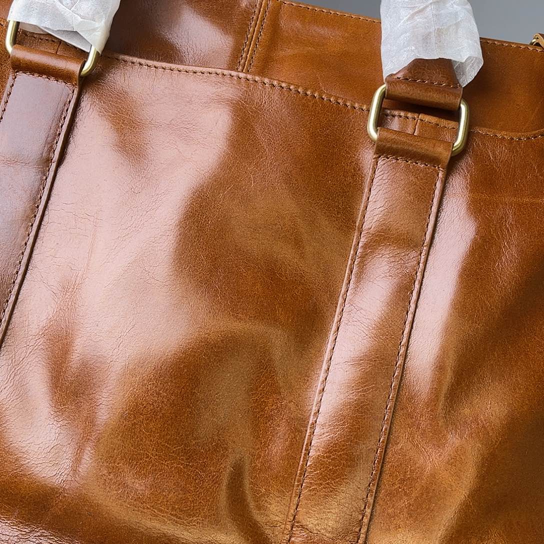 小****水牛剖层皮革公文包