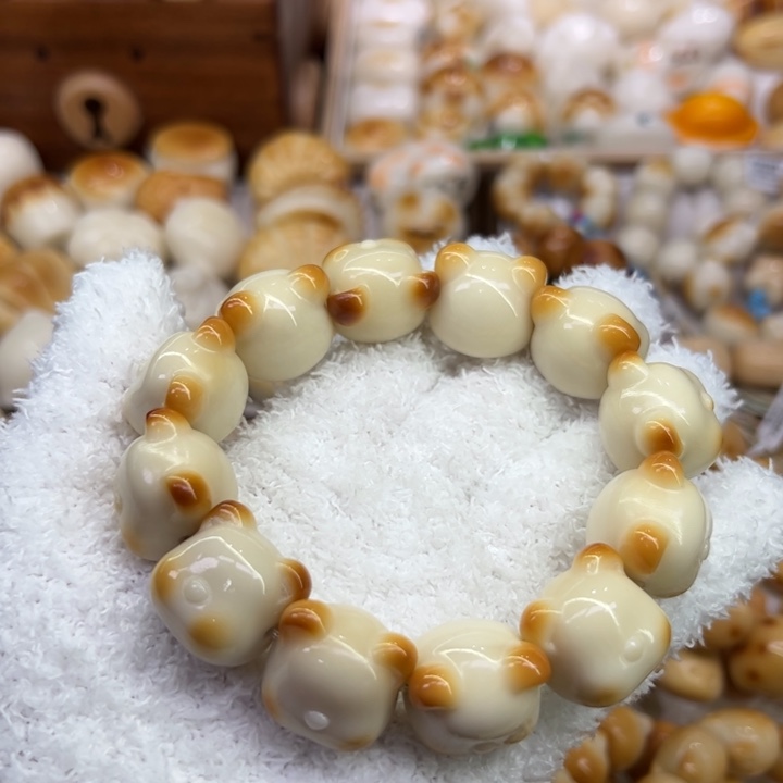 菩提根/象牙果把件55 象牙果原果雕刻炭烧小熊头全品