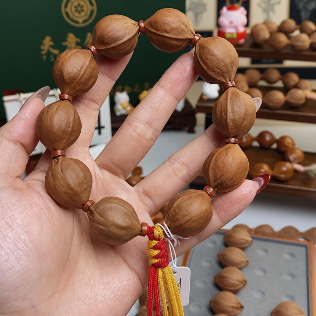 梁*开原生态20/25梅林铁核素串老树籽