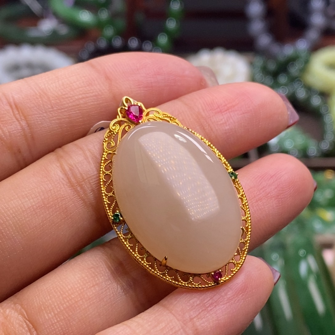 和田玉清货价藕粉金镶鸽子蛋未镶嵌