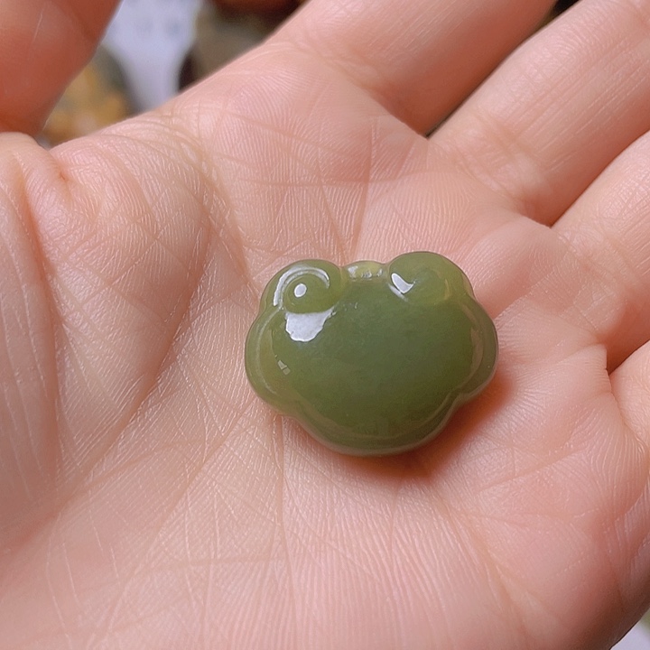 和田玉手把件未镶嵌