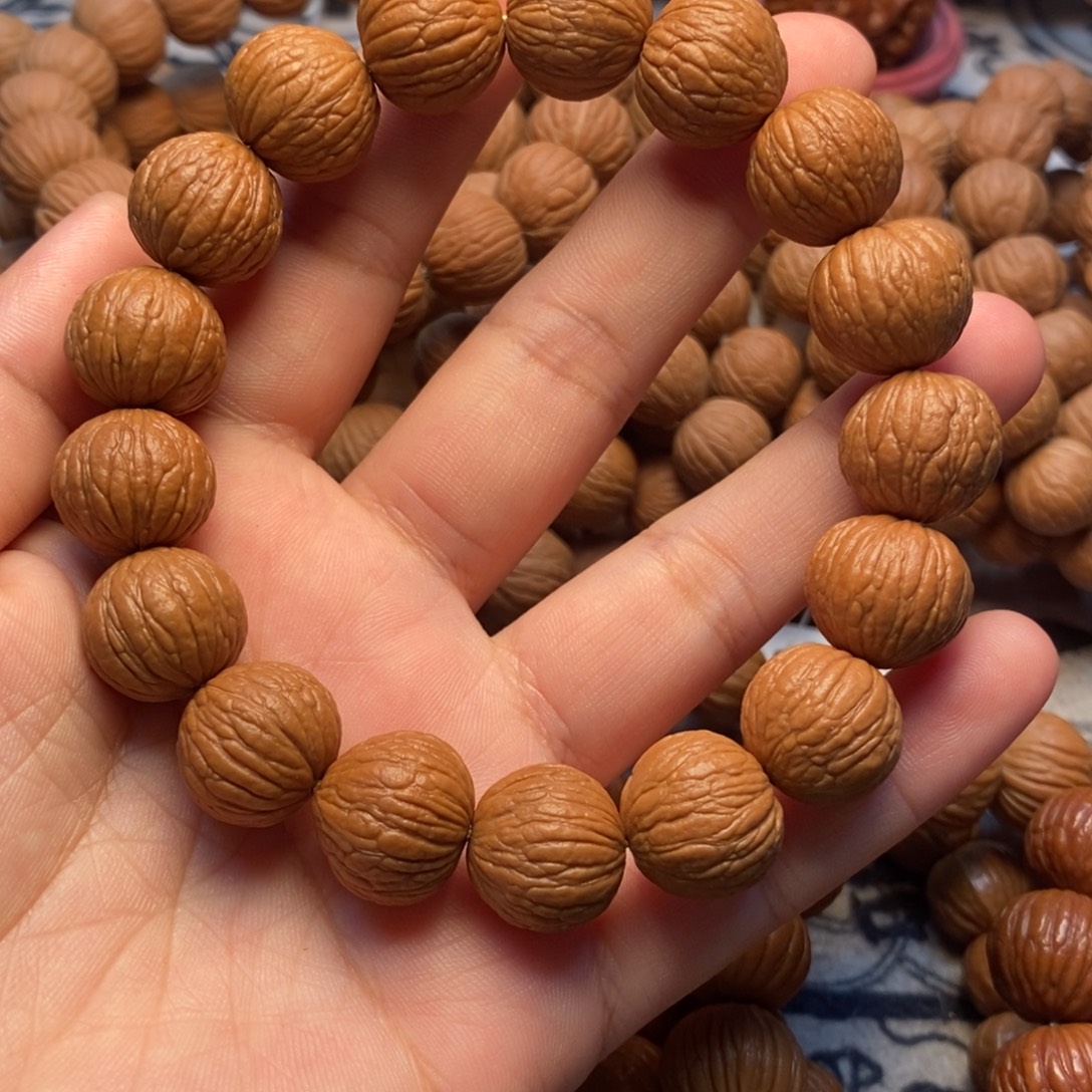 手串桃核15➕凤羽精打底