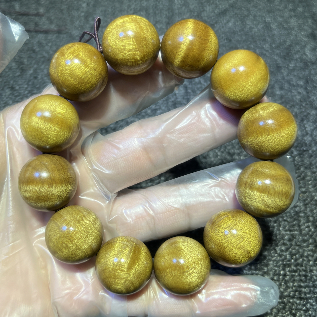 金丝楠木1.5水波纹猫眼手串男女通用（随机发货、单串纹理各不相同）