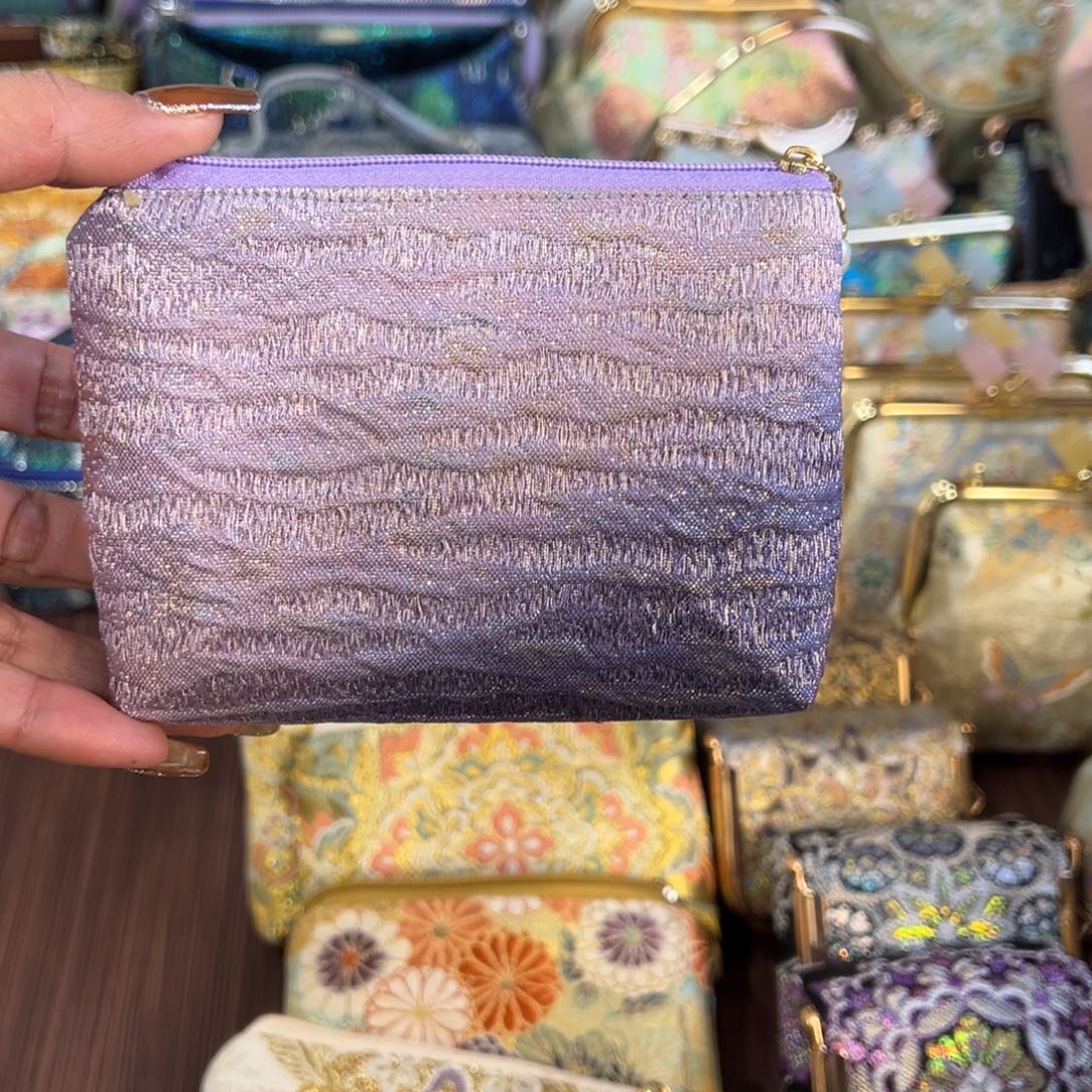 幸***0蚕丝紫色霞云零钱包