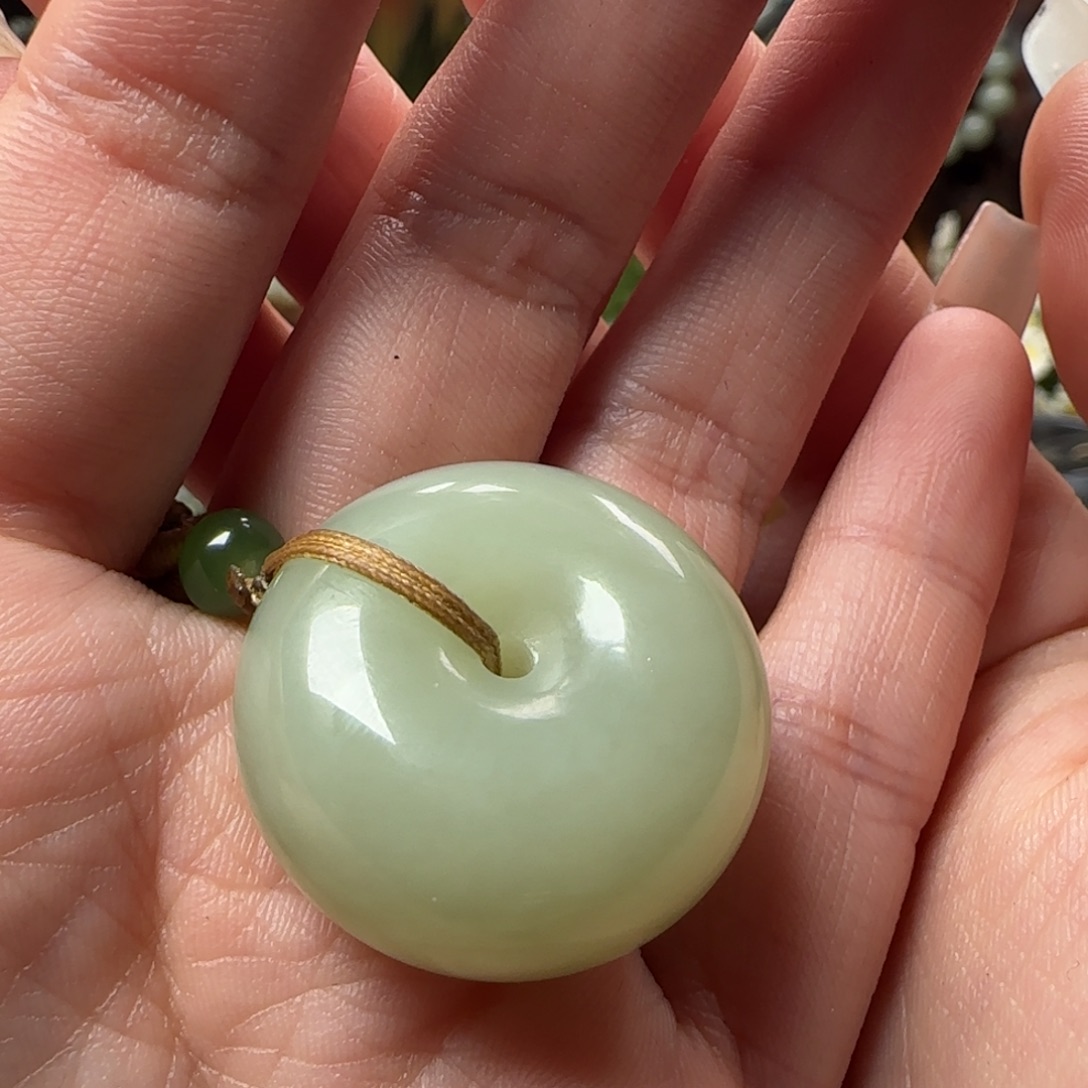 木***.和田玉未镶嵌颈饰