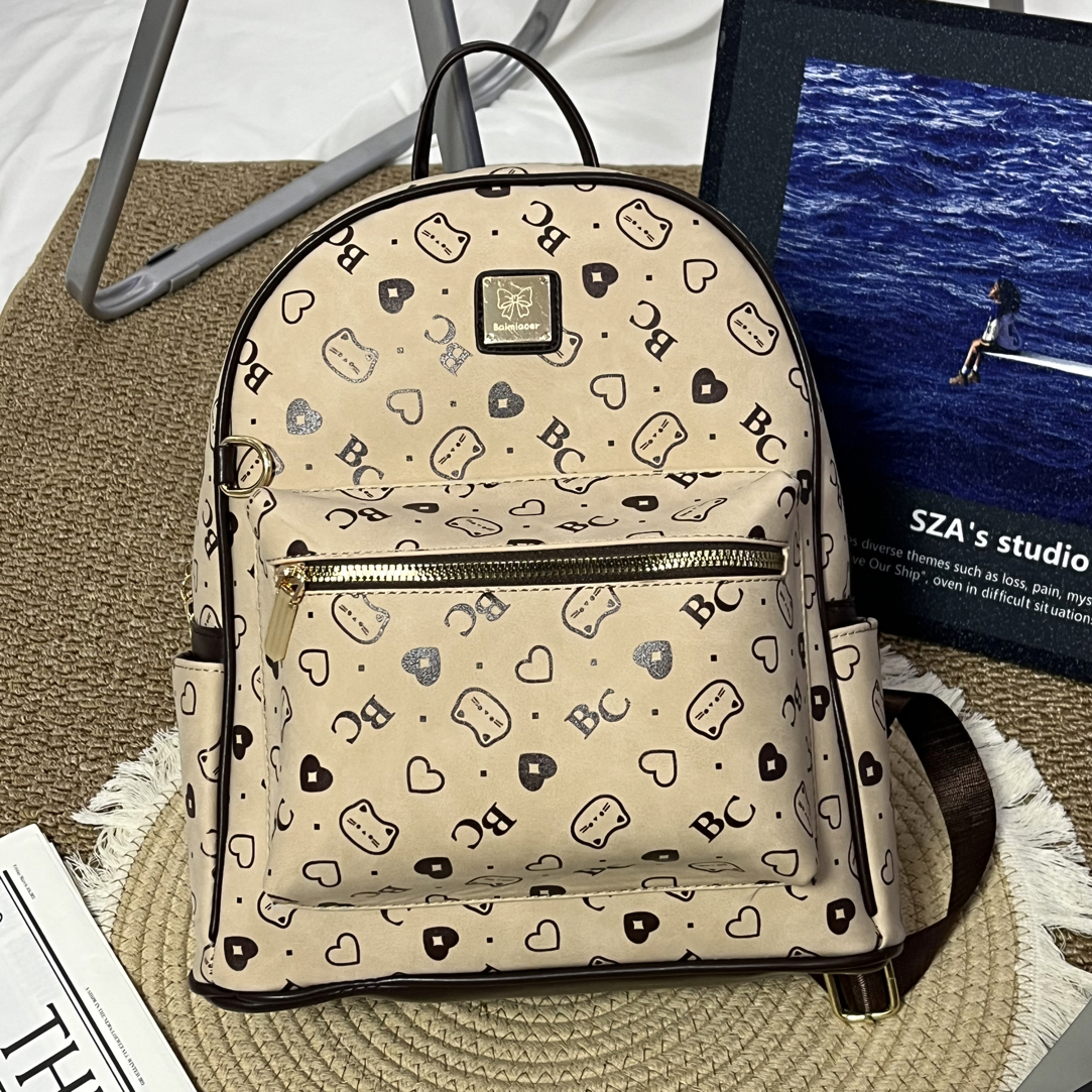 【萱麦】韩系新款奶茶色爱心小猫字母满印复古风百搭双肩背包