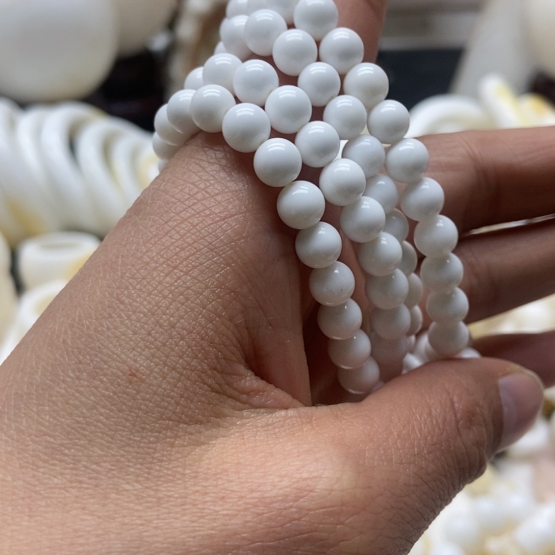 晓***贤0.6奶白珠123456789