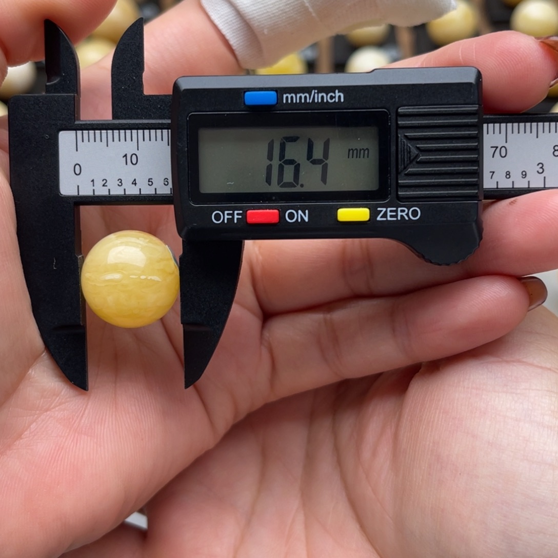 琥珀未镶嵌裸石蜜蜡圆珠笑