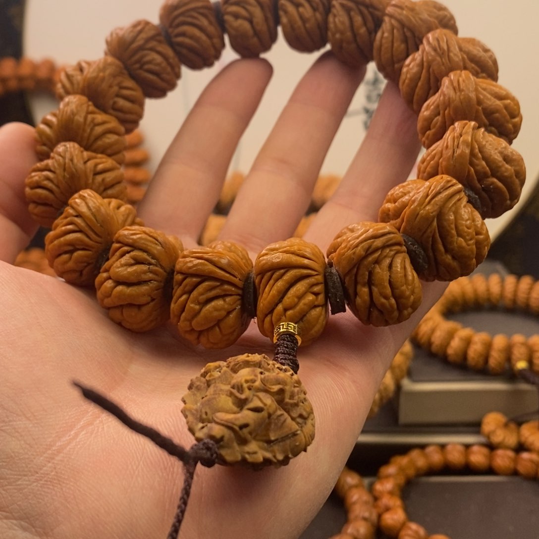 桃核手串25麒麟手持