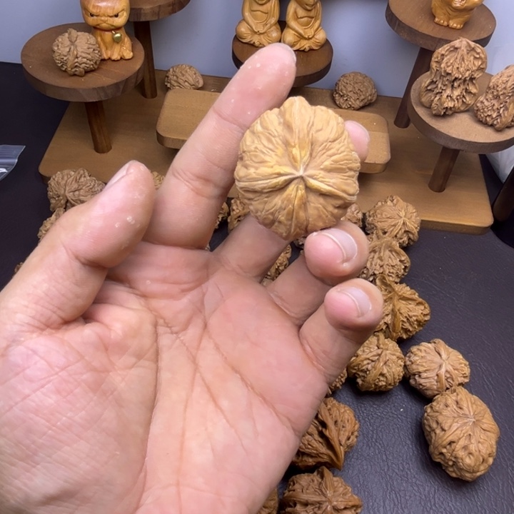 ****人吊坠桃核元宝四有黄