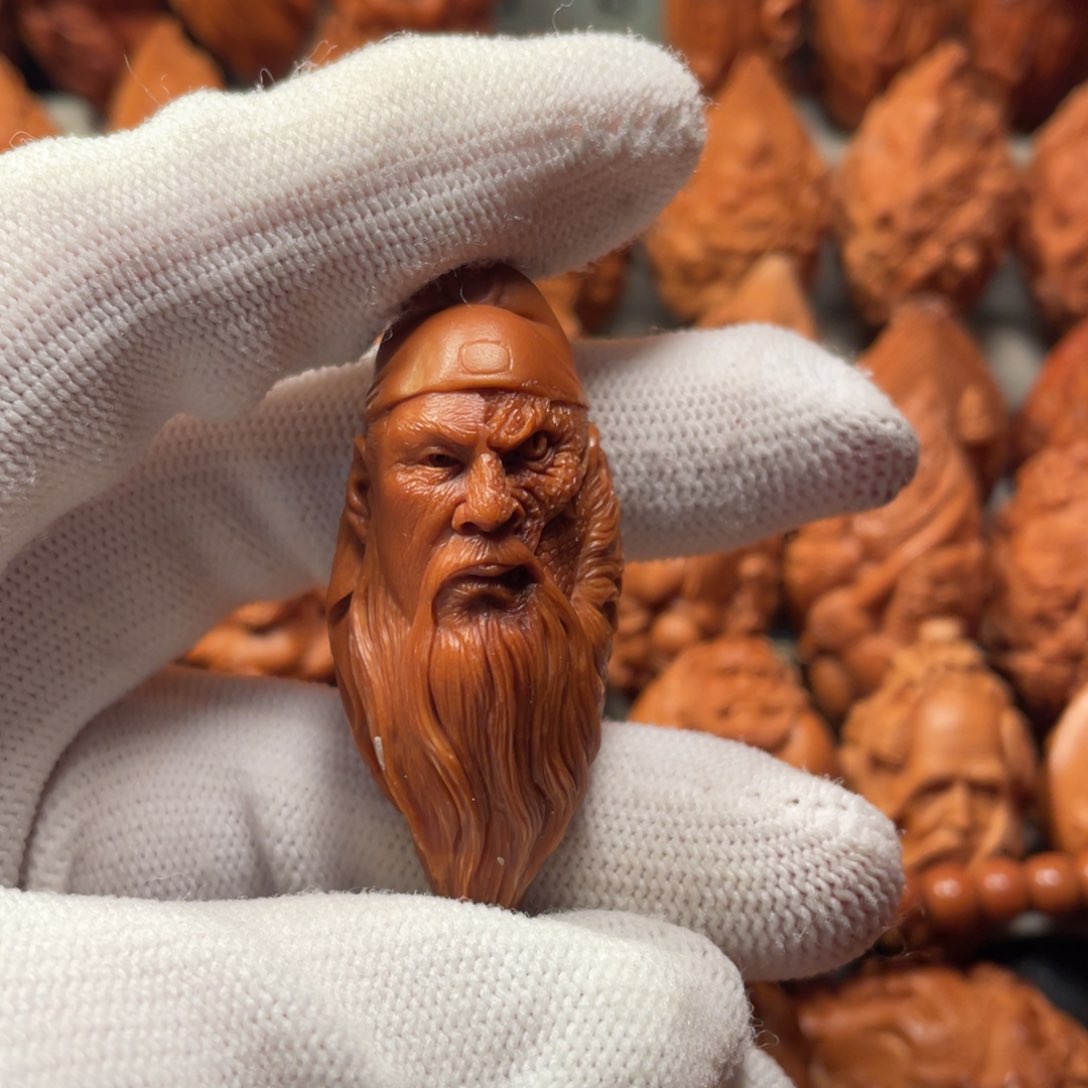 橄榄核吊坠一念关羽