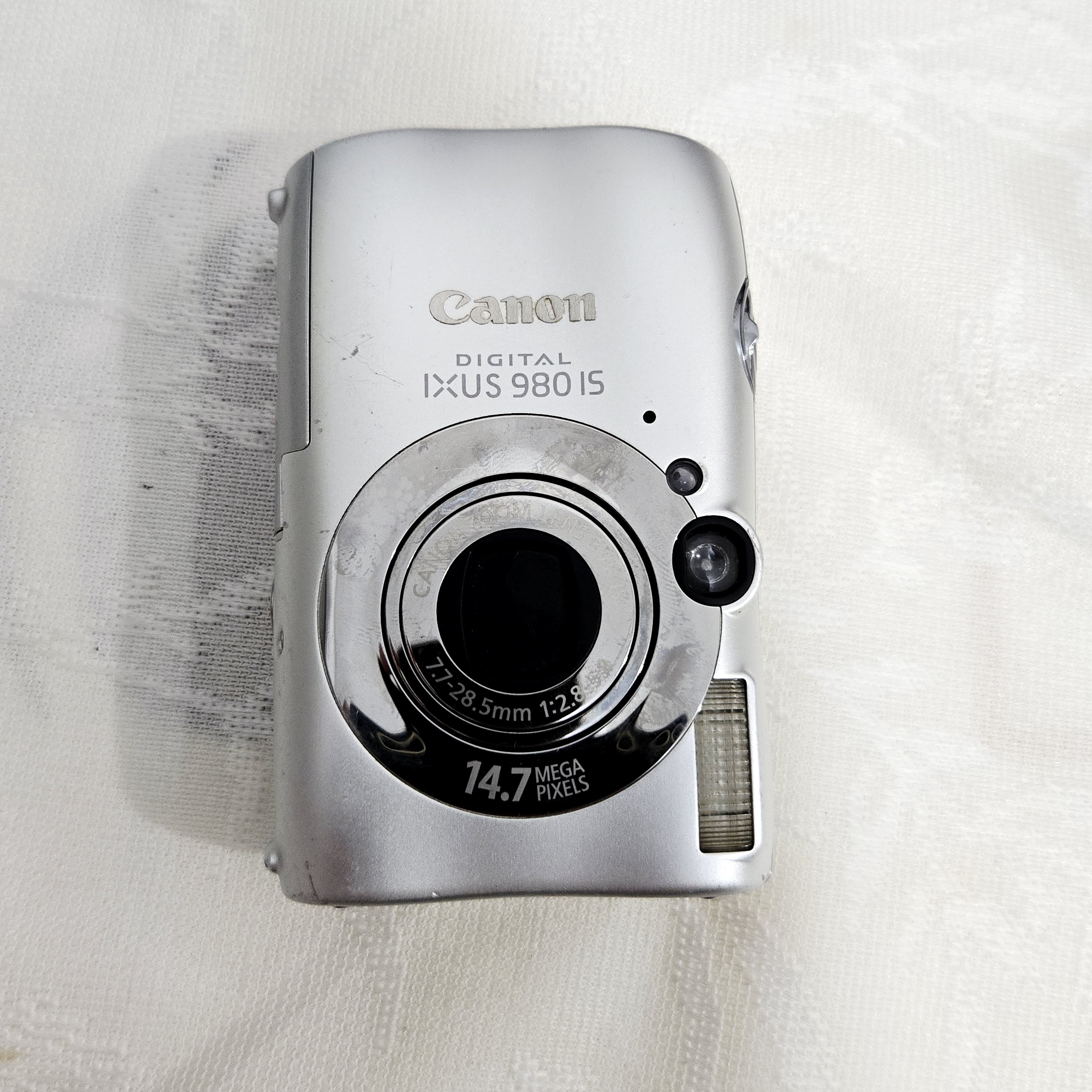 95新 Canon/佳能 ixus980is清晰自然白皮，1400w功能正常，3.7x光学